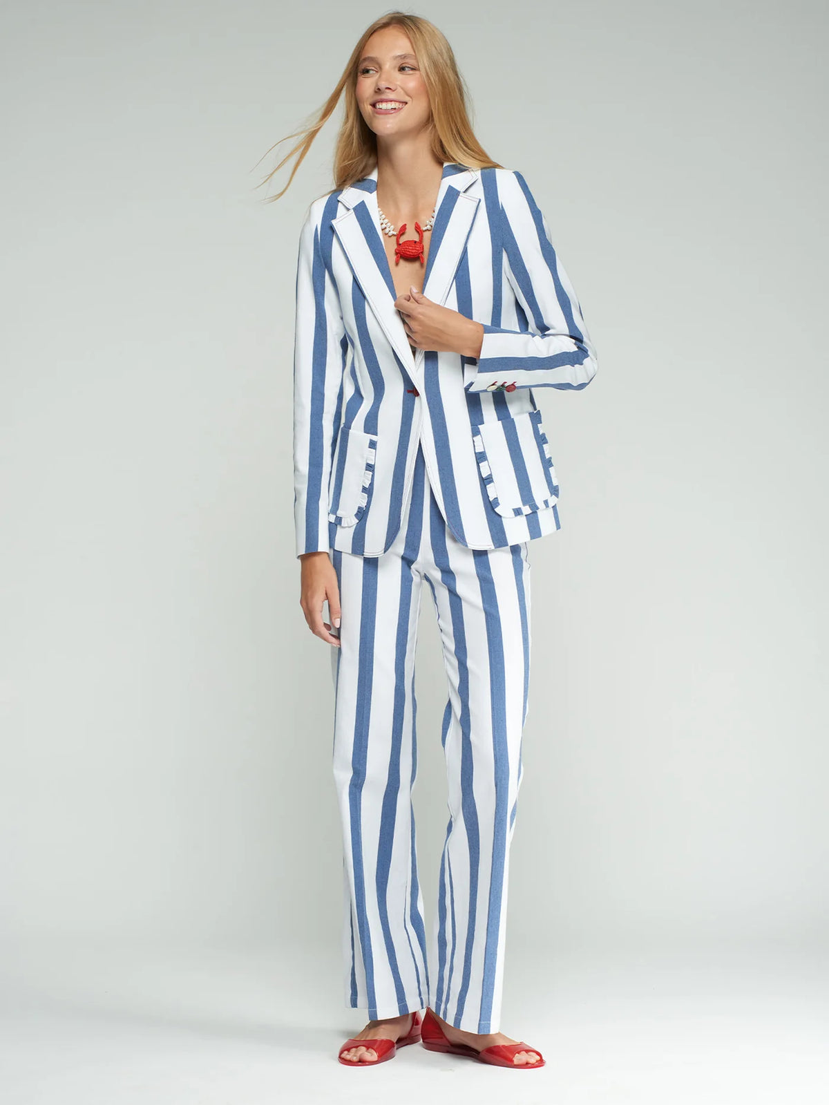Blue and white striped trousers with buttons